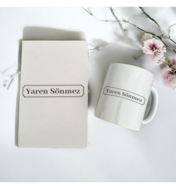 Kişiye Özel İsimli Taç Tasarım Siyah Beyaz Ajanda ve Beyaz Kupa Bardak Ürün Özellikleri; Defter ebadı:  • 1 Adet Kişiye Özel 13 cm x 21 cm Defter  • 9